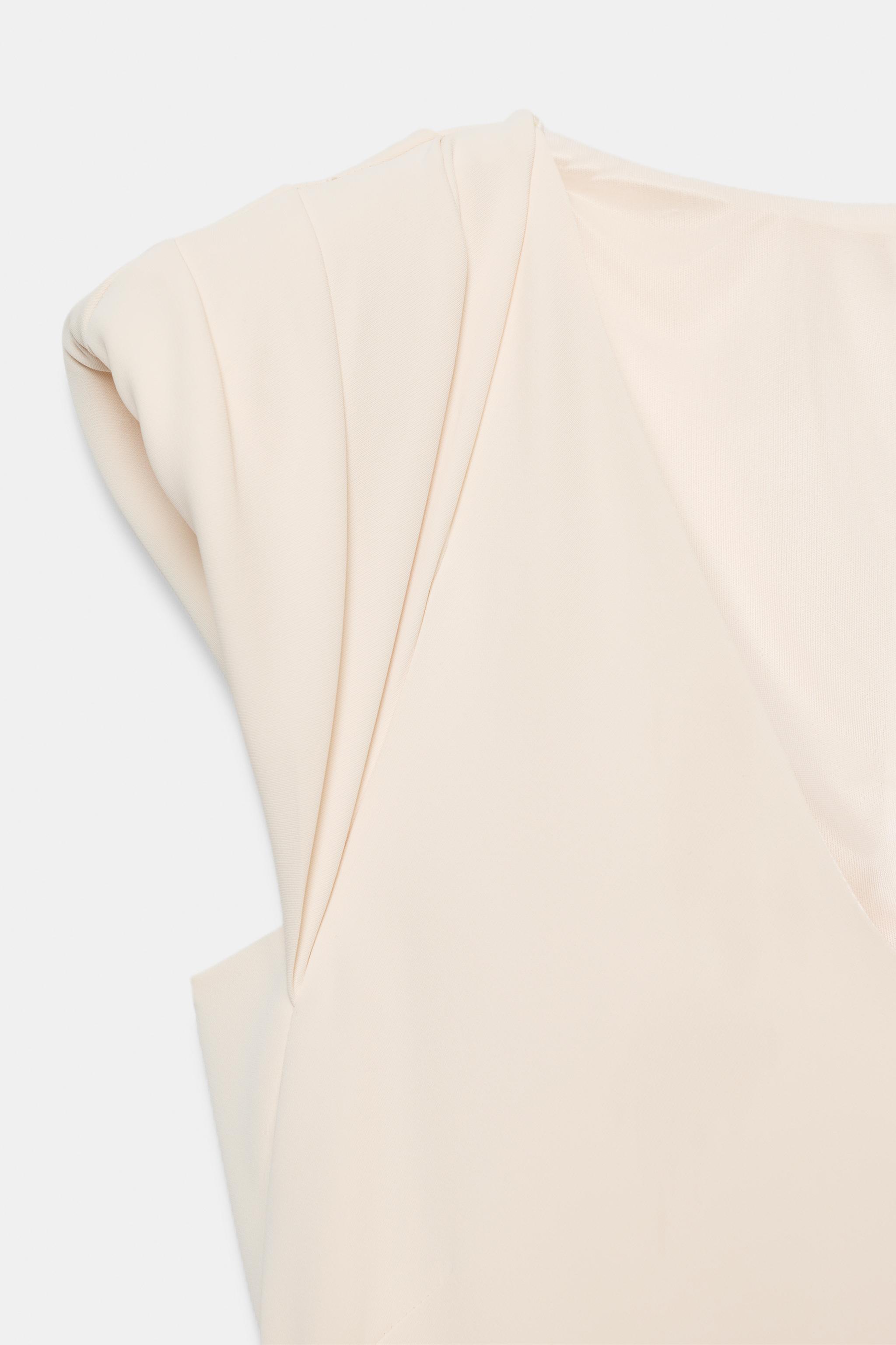 ASYMMETRIC SHORT DRESS WITH SHOULDER PADS